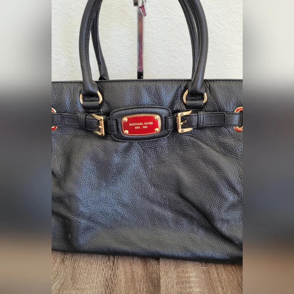 Michael Kors good larger
